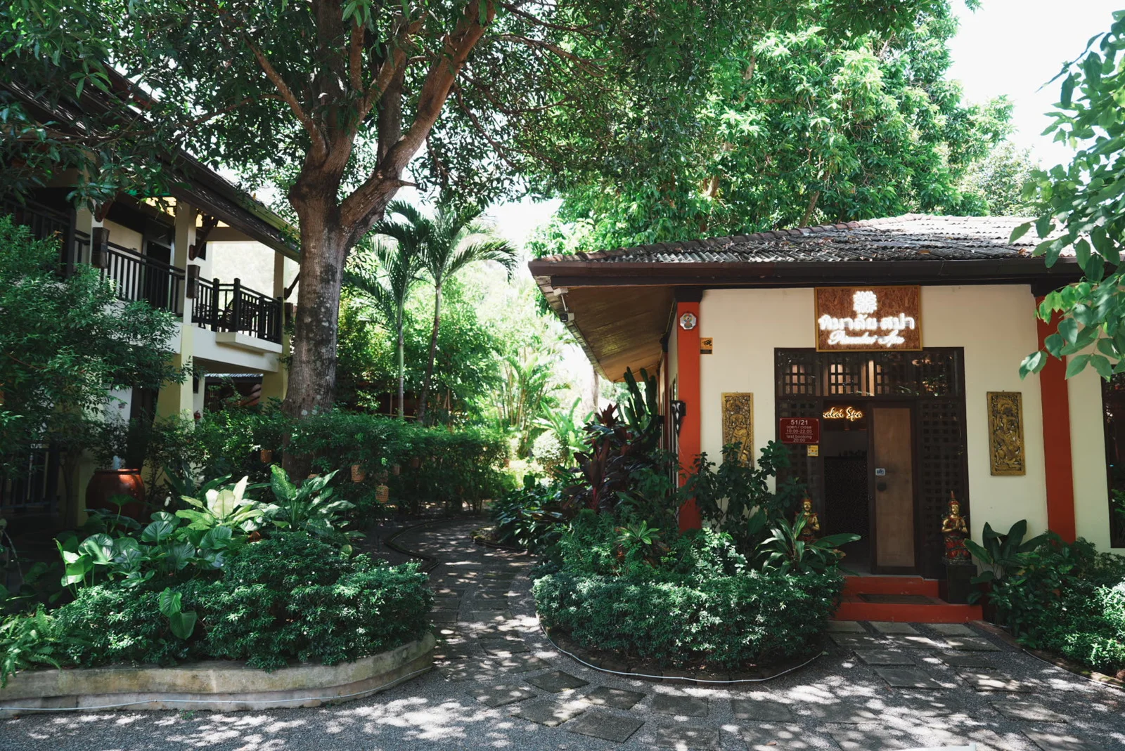 Pimalai Spa entrance surrounded by tropical plants
